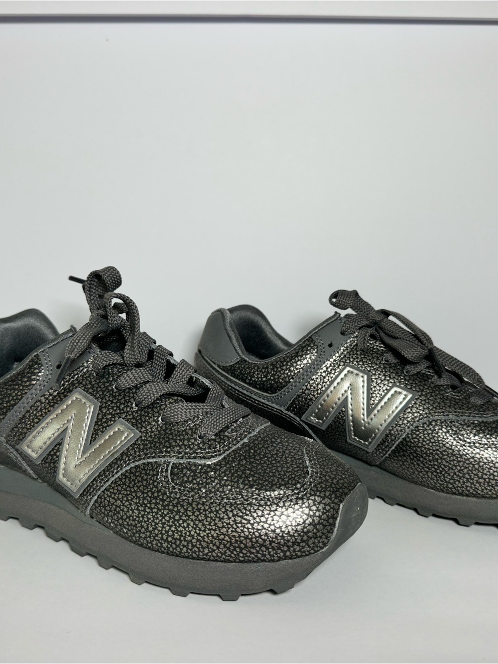 New Balance 574 Women’s Metallic Black Lifestyle Sneakers